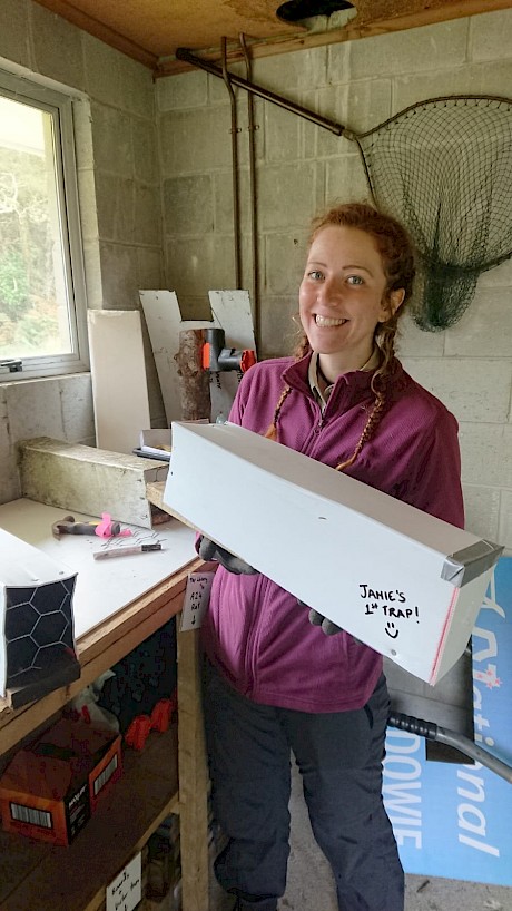 Volunteer Jamie building trap tunnels to stock the Community Trap Library